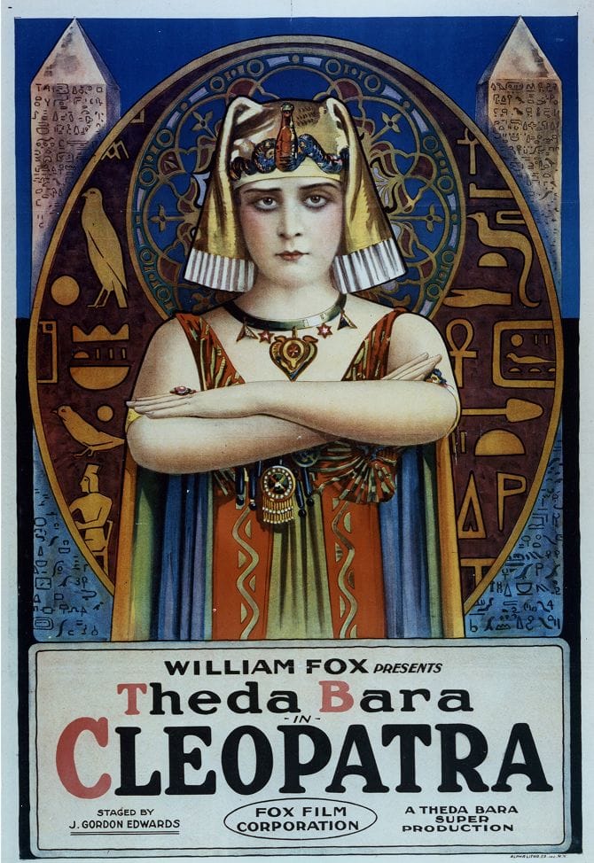 Vintage movie poster for "Cleopatra" starring Theda Bara, depicted in elaborate Egyptian attire surrounded by hieroglyphs.